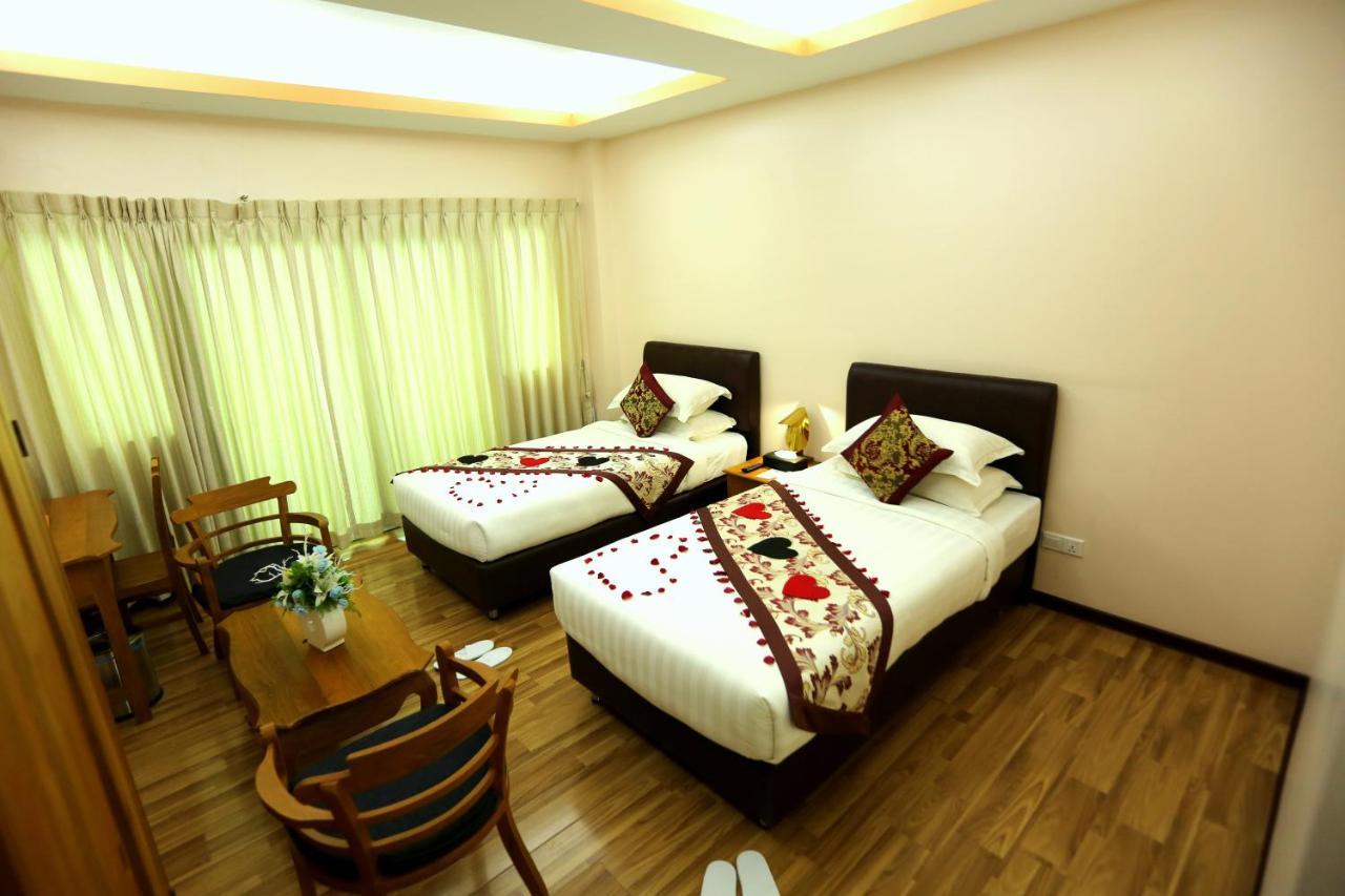 Hotel Sincere Smile Rangoon Buitenkant foto
