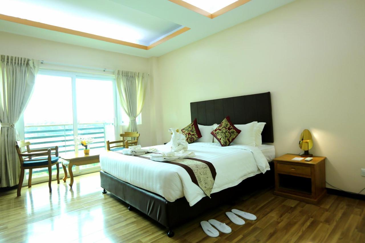 Hotel Sincere Smile Rangoon Buitenkant foto